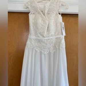 Brand new a line cap sleeve wedding dress with bustle.